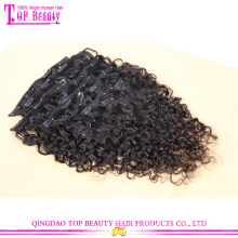 Qingdao top quality solto encaracolado virgin malaio em extensões de cabelo humano